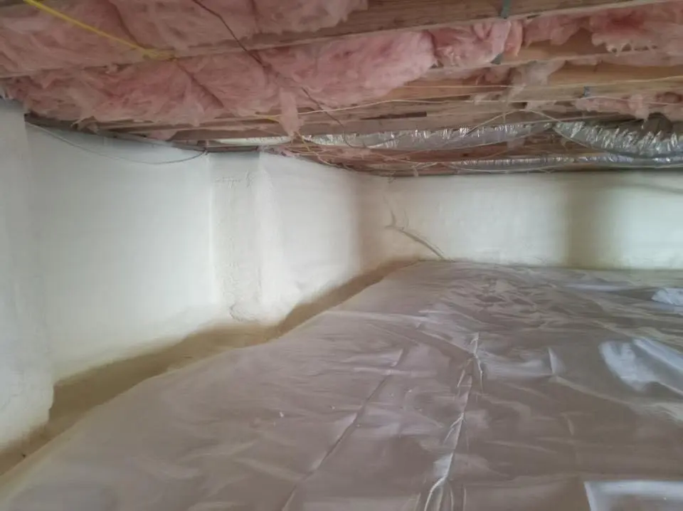 Crawl space encapsulation with closed-cell spray foam for Commercial Roof Restoration in Henderson